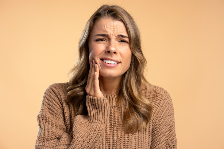 woman with mouth pain